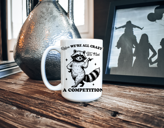 We're All Crazy It's Not A Competition Mug